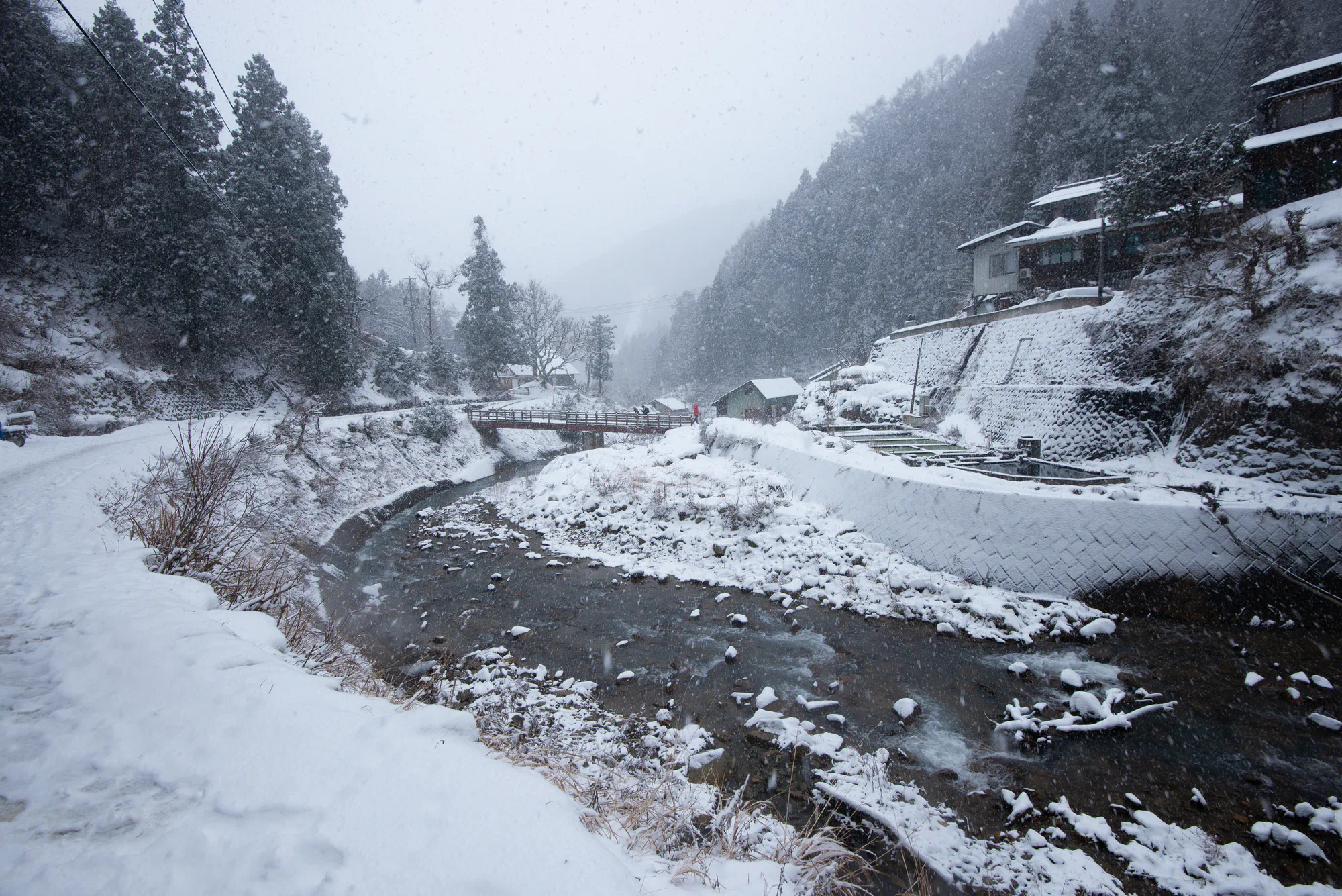 snowy stream in valley